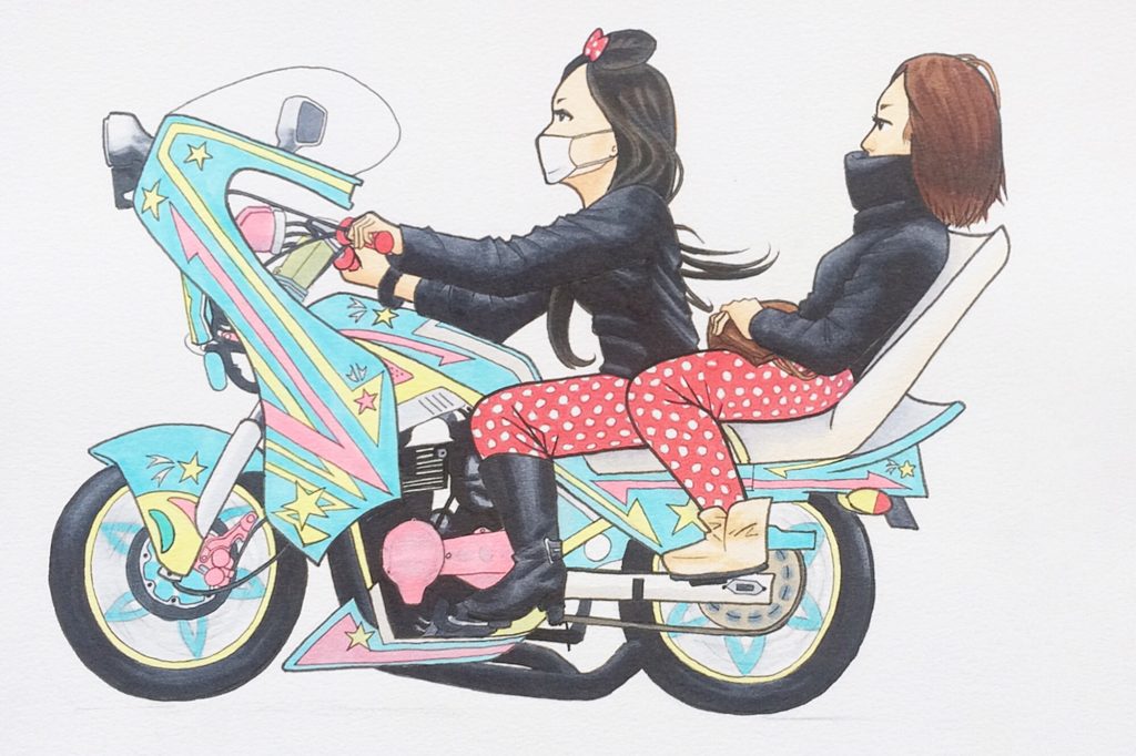A drawing in markers of two girls on a motorcycle
